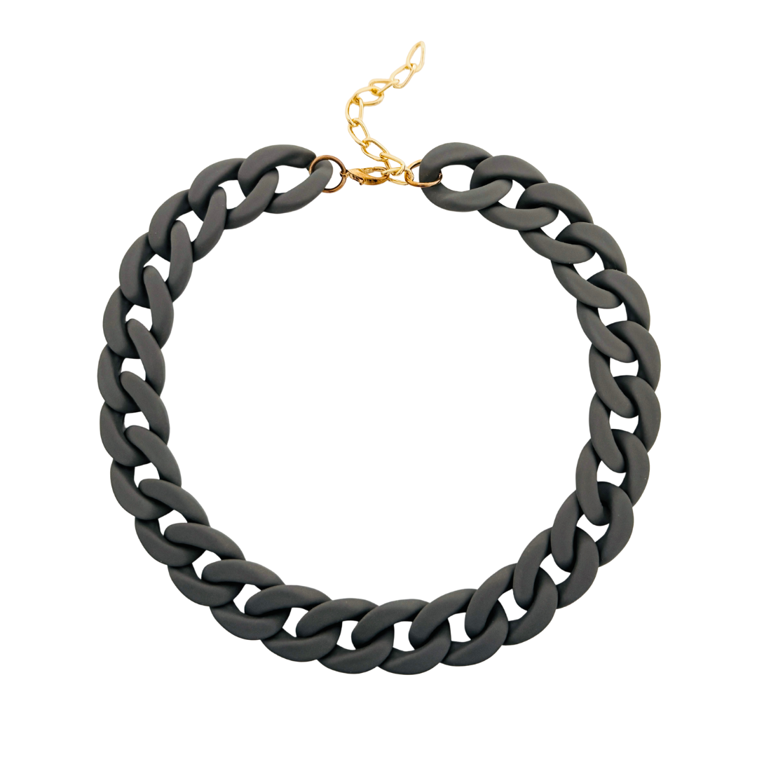 Black chain necklace with gold clasp on a white background