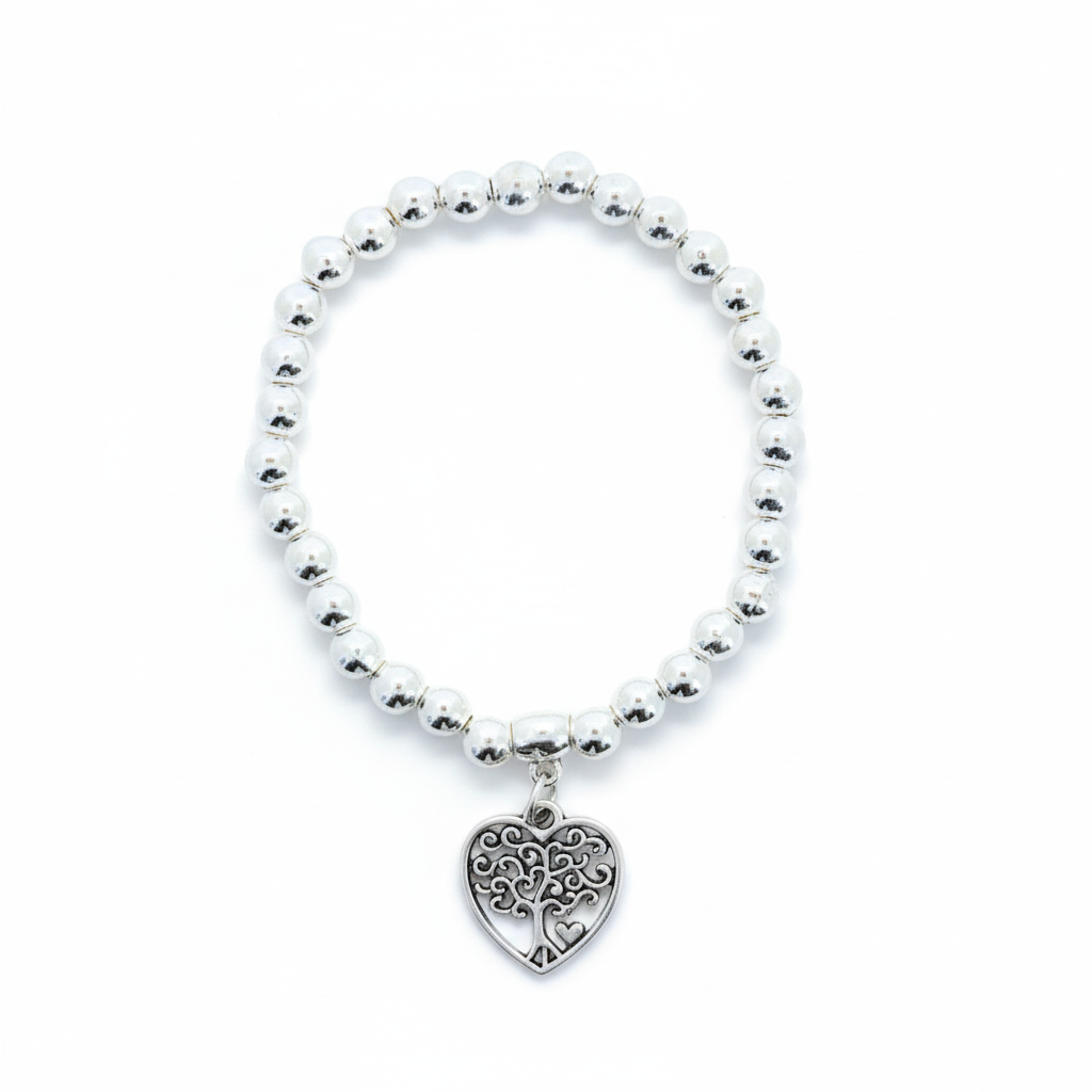 Bracelet with heart-shaped charm on a white background