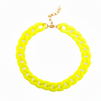 Neon yellow chain necklace on a white background