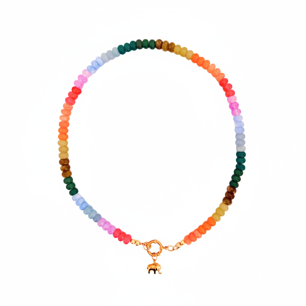 A beaded necklace arranged in a circle on a white background, featuring a gradient of colorful translucent beads from dark green to orange, pink, light blue, and brown, finished with a gold clasp and small elephant charm.