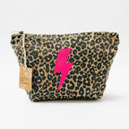 Leopard print pouch with a pink lightning bolt on a white surface