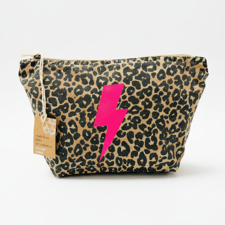 Leopard print pouch with a pink lightning bolt on a white surface