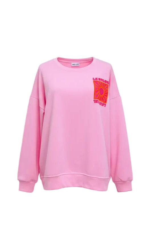 Pink sweatshirt on a mannequin with a wide-brimmed hat against a white background with butterfly decorations.