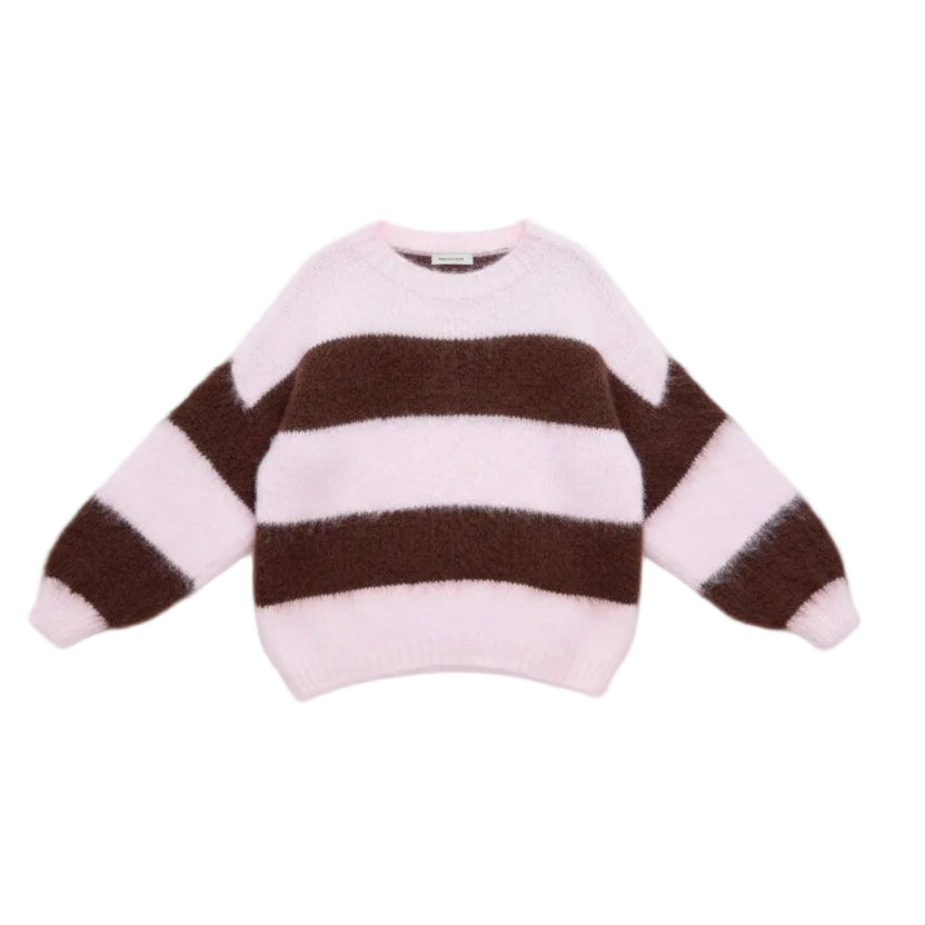 Mannequin wearing a pink and brown striped sweater with a white hat on a white background with butterfly decorations.