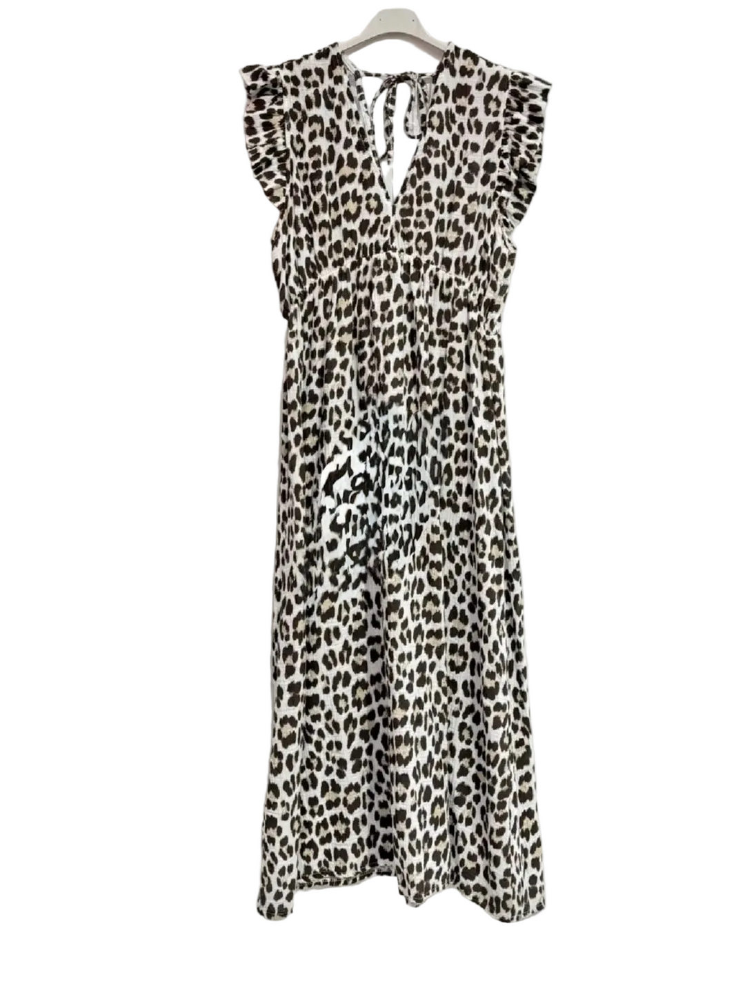 Leopard print dress on a hanger against a white background
