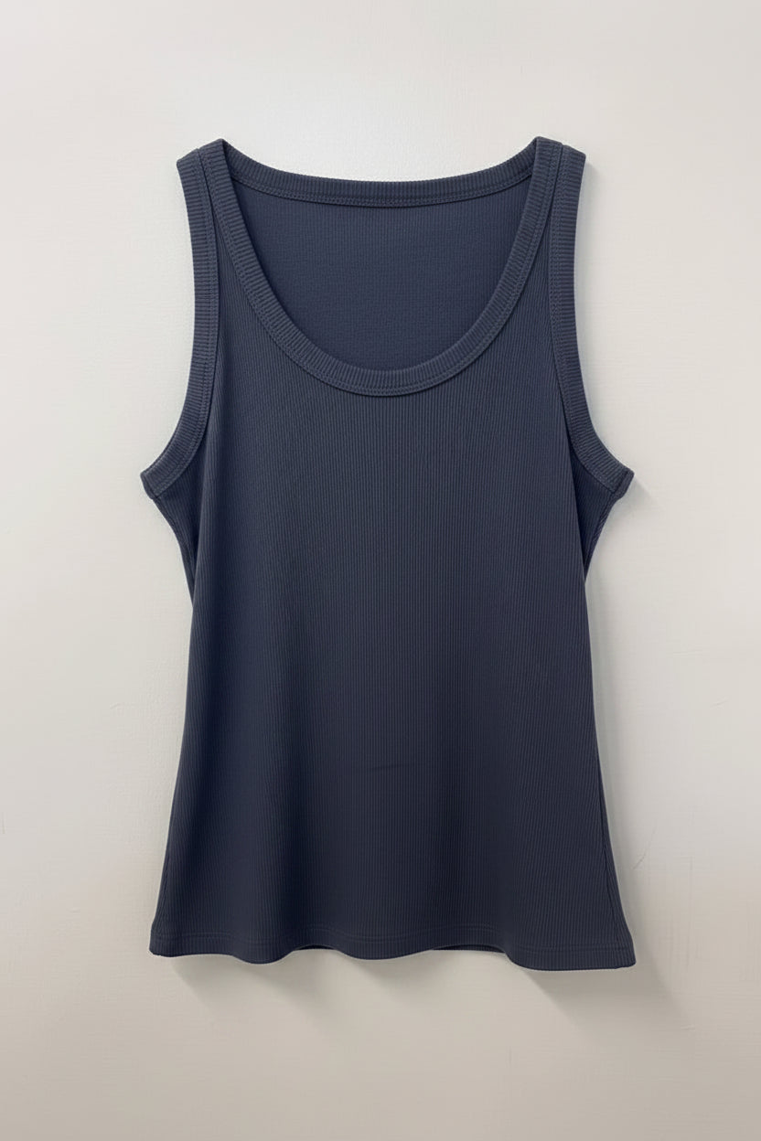 Navy blue tank top on a wooden hanger against a white background