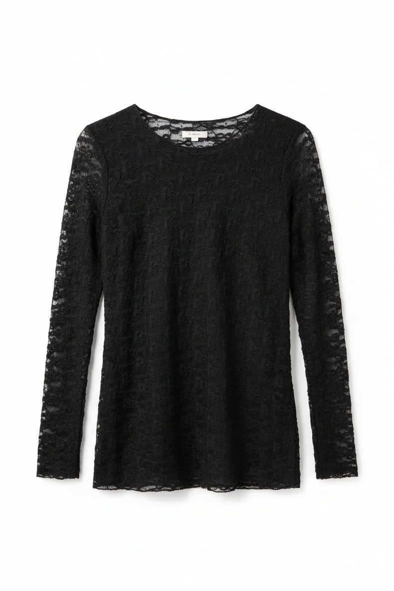 Black textured dress on a white woven surface