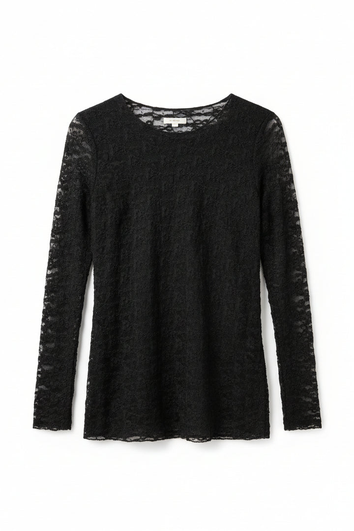 Black textured dress on a white woven surface