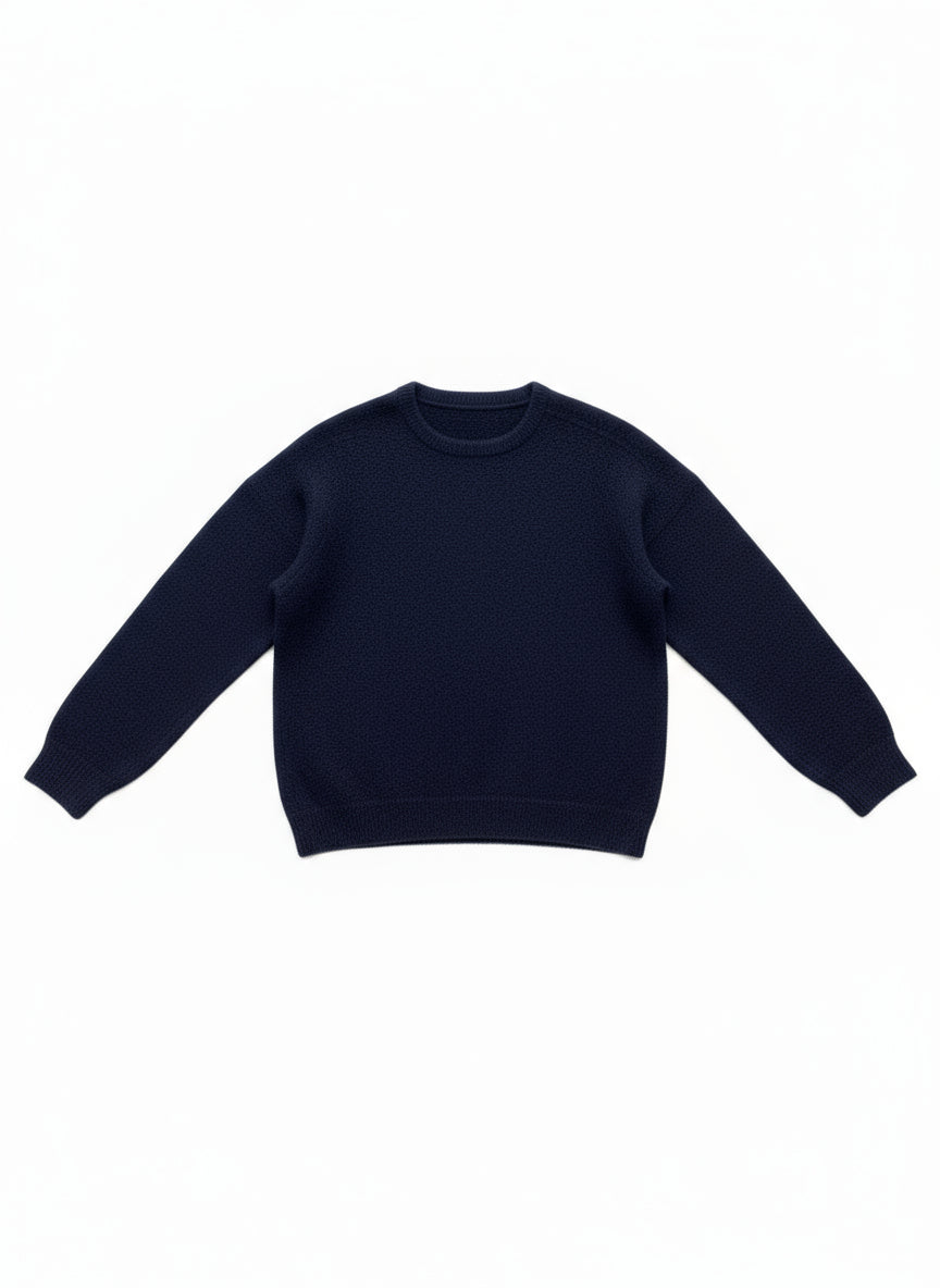 Navy blue sleeveless top on a white wooden surface