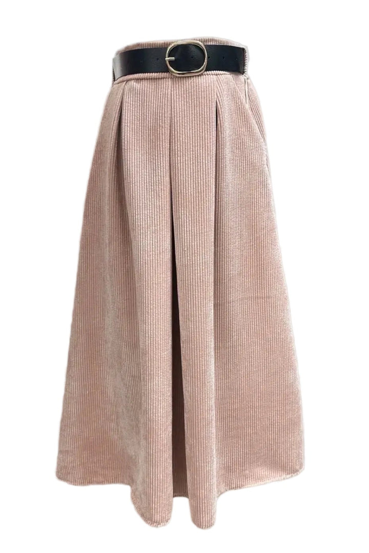 A pleated midi skirt in dusty pink corduroy fabric, styled with a black leather belt featuring a gold-tone oval buckle, shown against a light gray background.