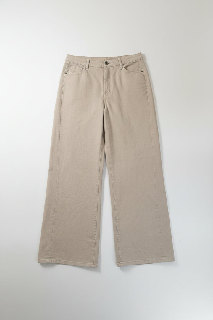 Beige pants on a hanger against a white background