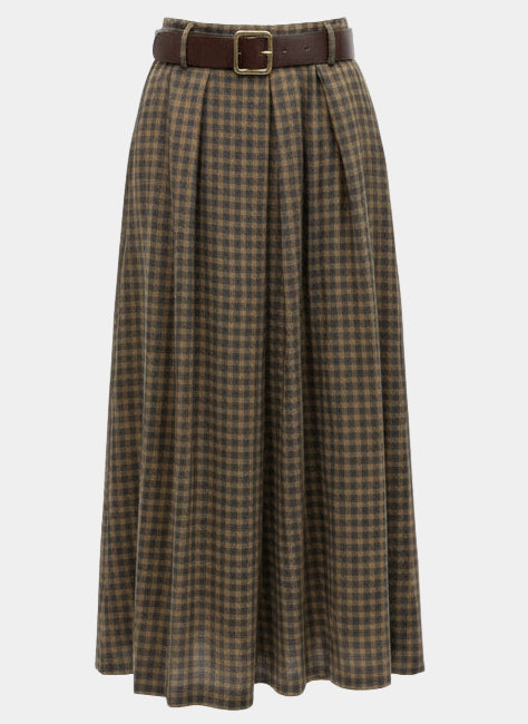 Stack of folded plaid fabric with a belt on a display stand.