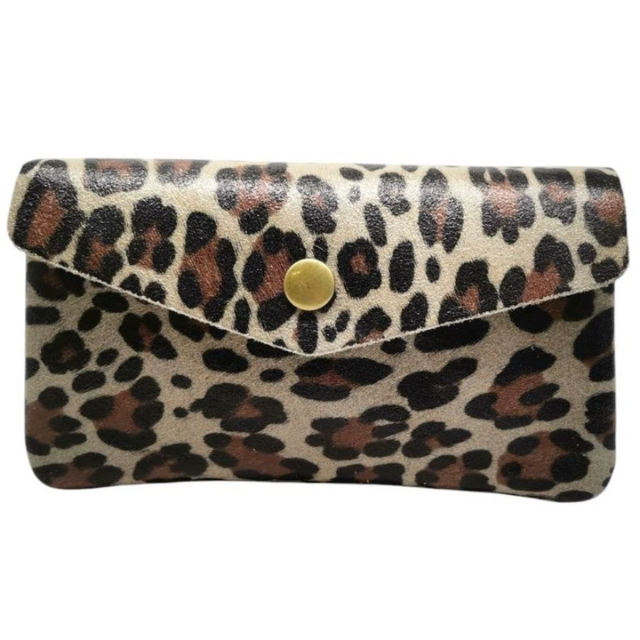 Leopard print clutch bag with a gold button on a white background