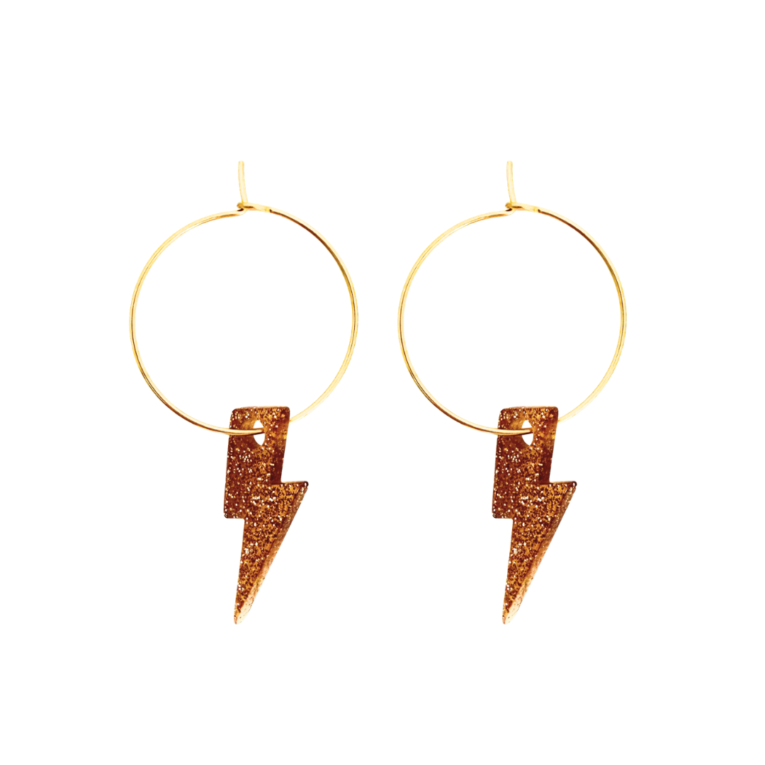 Gold hoop earrings with bronze lightning bolt charms on a white background