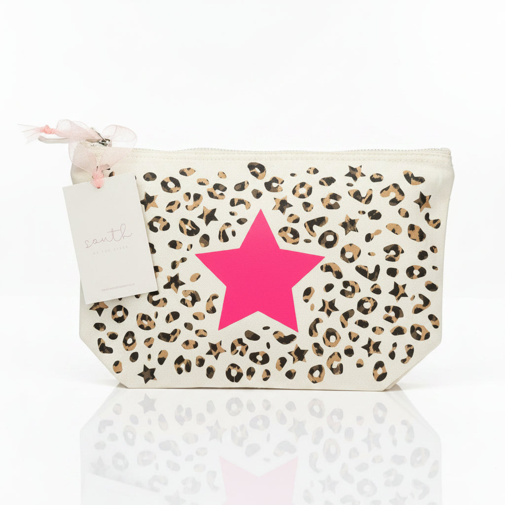 Leopard print pouch with a pink star and a tag on a gray surface