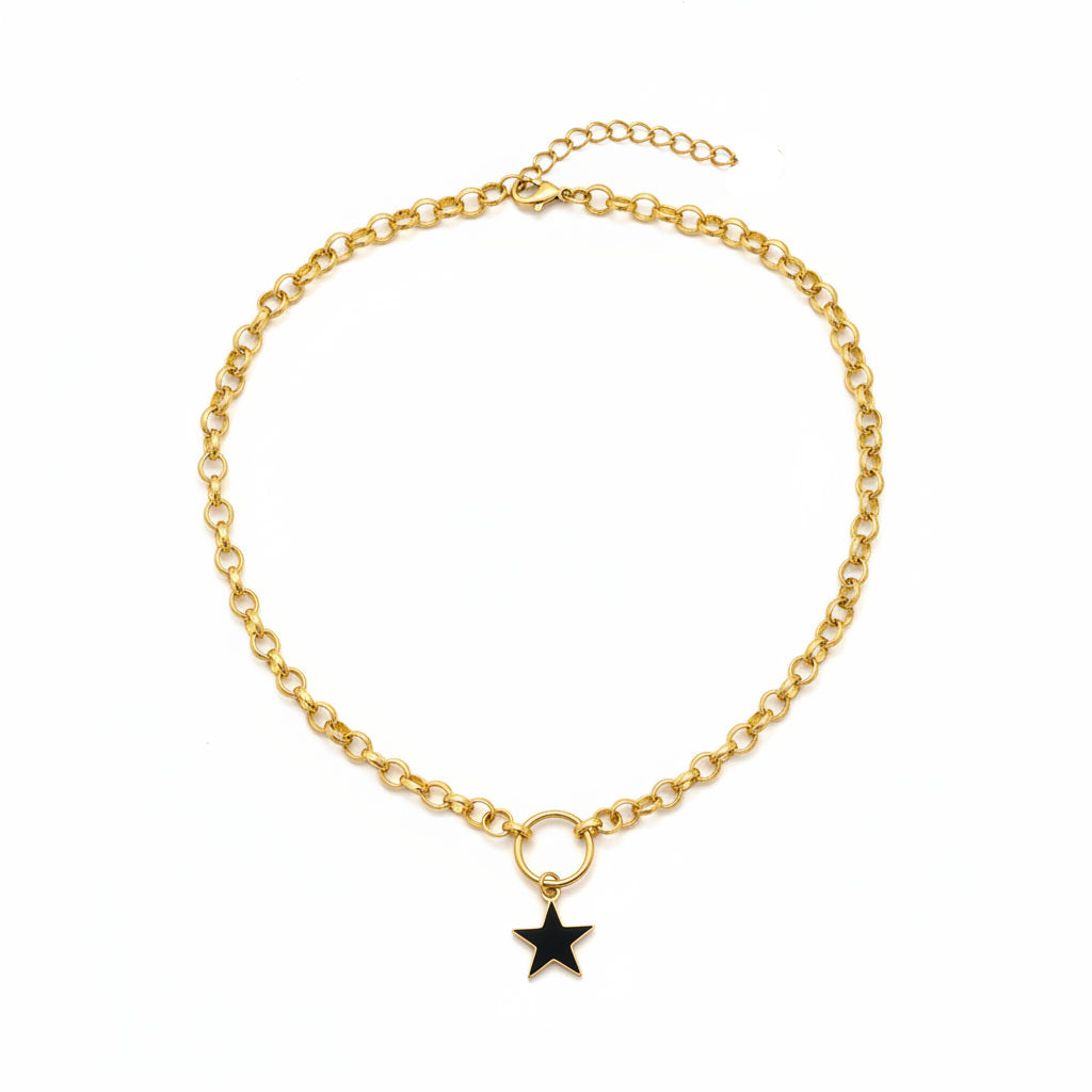 A gold chain choker necklace featuring a small black star charm suspended from a gold ring, displayed on a clean white background.
