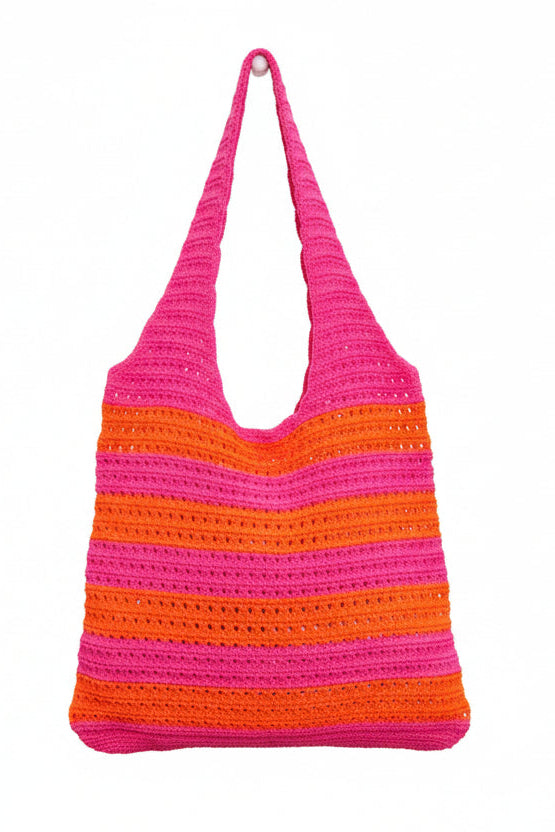 Crocheted bag with pink and orange stripes on a white background