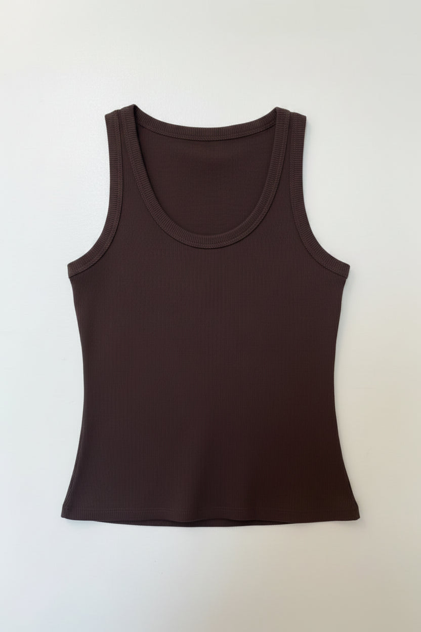 Brown tank top on a wooden hanger against a white background