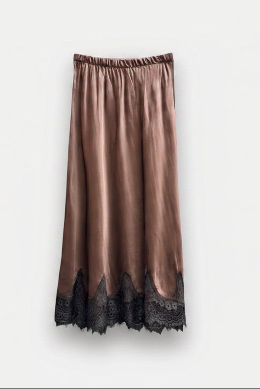 A brown satin midi skirt with a black lace hem, hanging on a wooden hanger against a light gray background.