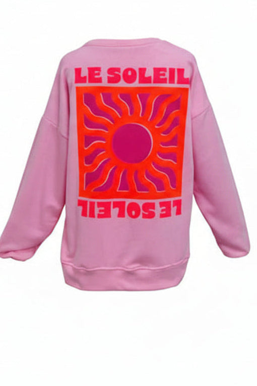 Pink sweatshirt with 'Le Soleil' text and sun design on a mannequin against a white background with decorative butterflies.