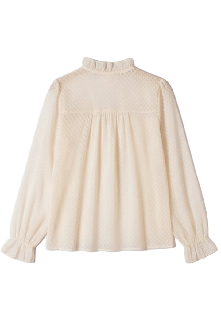 Cream-colored blouse with long sleeves on a white background