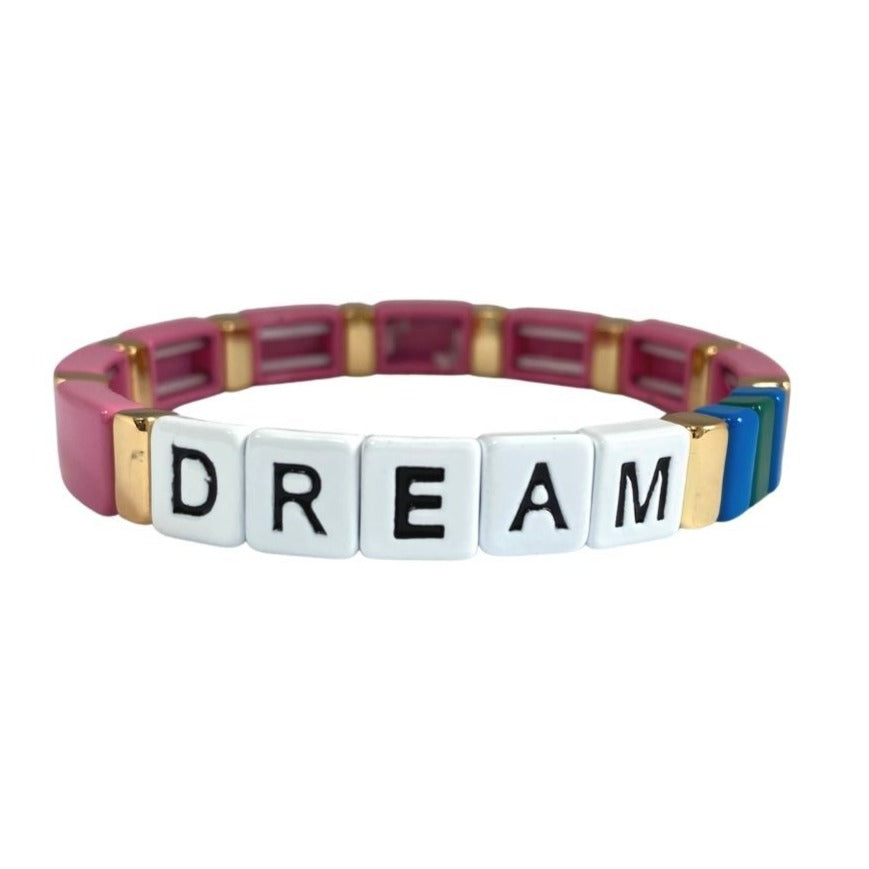 Accessory bracelet with pink, blue and gold enamel tiles and dream slogan - south of the river london